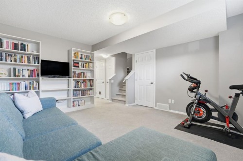 4008 New Brighton Grove Se, Calgary, AB - Indoor Photo Showing Gym Room
