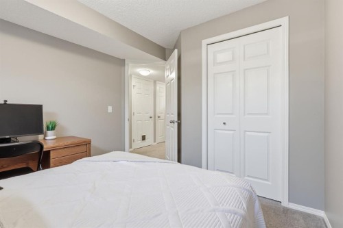 4008 New Brighton Grove Se, Calgary, AB - Indoor Photo Showing Bedroom