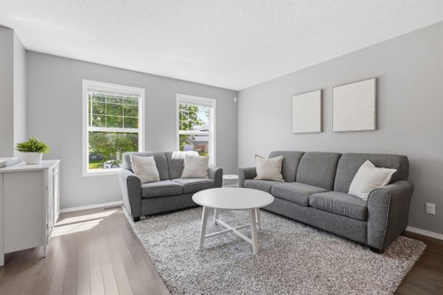 4008 New Brighton Grove Se, Calgary, AB - Indoor Photo Showing Living Room