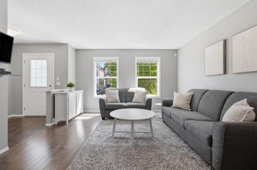 4008 New Brighton Grove Se, Calgary, AB - Indoor Photo Showing Living Room