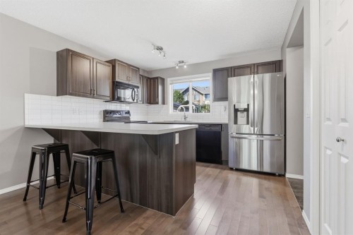4008 New Brighton Grove Se, Calgary, AB - Indoor Photo Showing Kitchen With Upgraded Kitchen