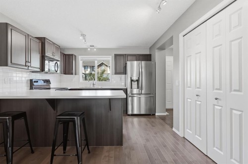 4008 New Brighton Grove Se, Calgary, AB - Indoor Photo Showing Kitchen With Upgraded Kitchen