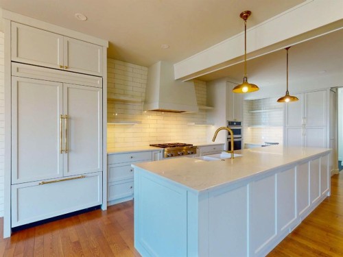 54 Royal Ridge Mount Nw, Calgary, AB - Indoor Photo Showing Kitchen With Double Sink