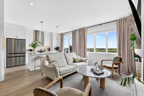 90 Savoy Landing Se, Calgary, AB - Indoor Photo Showing Living Room