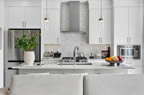 90 Savoy Landing Se, Calgary, AB - Indoor Photo Showing Kitchen With Upgraded Kitchen