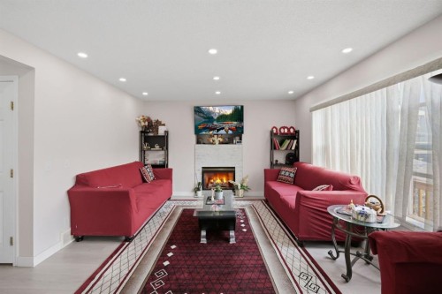 54 Saddlecreek Crescent Ne, Calgary, AB - Indoor With Fireplace