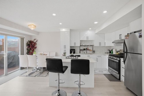54 Saddlecreek Crescent Ne, Calgary, AB - Indoor Photo Showing Kitchen With Stainless Steel Kitchen With Upgraded Kitchen