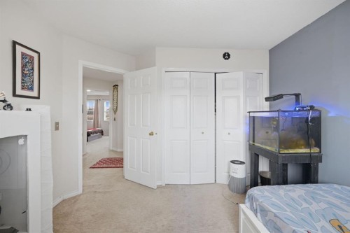 54 Saddlecreek Crescent Ne, Calgary, AB - Indoor Photo Showing Bedroom