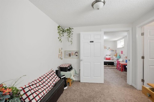 54 Saddlecreek Crescent Ne, Calgary, AB - Indoor Photo Showing Other Room