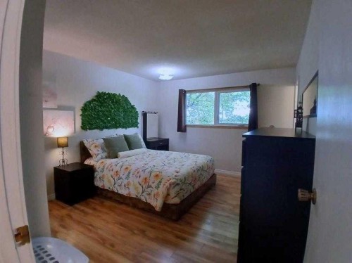 3808 49A Avenue, Innisfail, AB - Indoor Photo Showing Bedroom