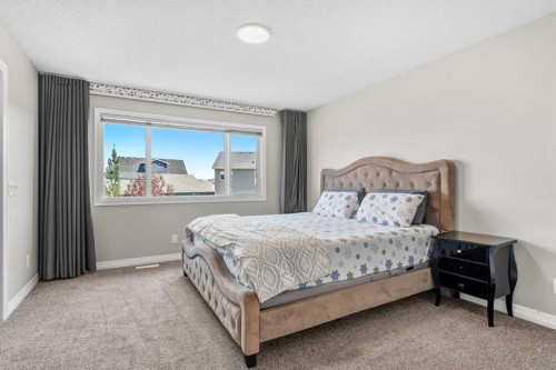 34 Seton Road Se, Calgary, AB - Indoor Photo Showing Bedroom