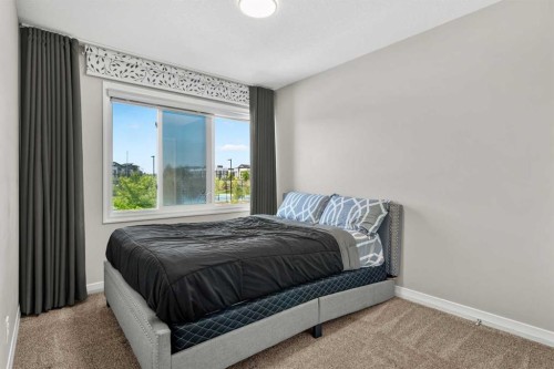 34 Seton Road Se, Calgary, AB - Indoor Photo Showing Bedroom