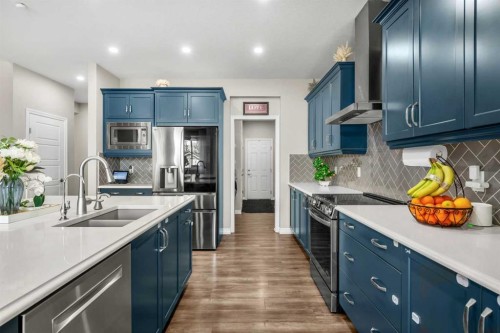 34 Seton Road Se, Calgary, AB - Indoor Photo Showing Kitchen With Double Sink With Upgraded Kitchen
