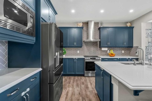 34 Seton Road Se, Calgary, AB - Indoor Photo Showing Kitchen With Double Sink With Upgraded Kitchen