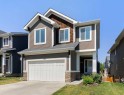 434 River Heights Drive, Cochrane, AB  - Outdoor With Facade 