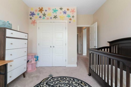 434 River Heights Drive, Cochrane, AB - Indoor Photo Showing Bedroom