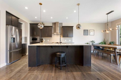 434 River Heights Drive, Cochrane, AB - Indoor Photo Showing Kitchen With Upgraded Kitchen