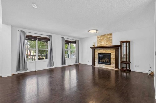813 Prestwick Circle Se, Calgary, AB - Indoor Photo Showing Living Room With Fireplace