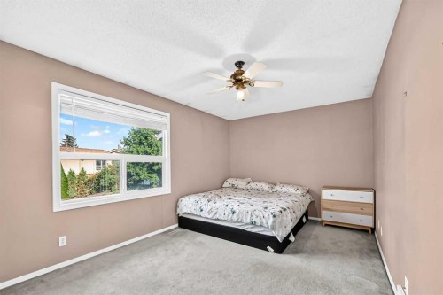 13-123 Queensland Drive Se, Calgary, AB - Indoor Photo Showing Bedroom