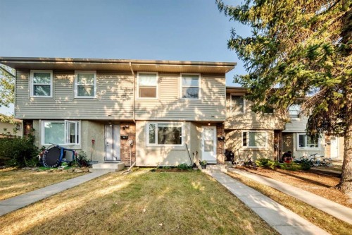 13-123 Queensland Drive Se, Calgary, AB - Outdoor With Facade