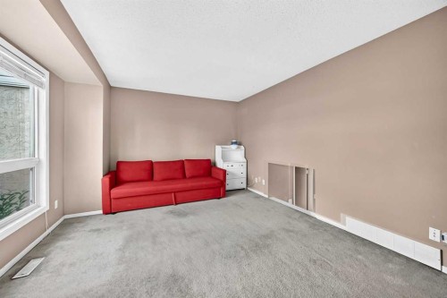 13-123 Queensland Drive Se, Calgary, AB - Indoor Photo Showing Other Room