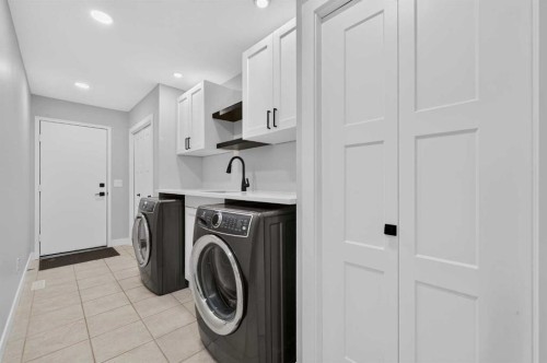 12 Sunset Way, Priddis Greens, AB - Indoor Photo Showing Laundry Room