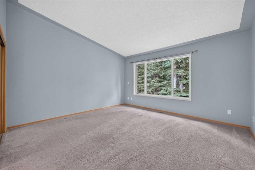 12 Sunset Way, Priddis Greens, AB - Indoor Photo Showing Other Room