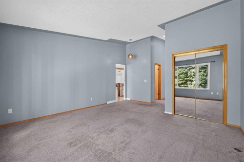 12 Sunset Way, Priddis Greens, AB - Indoor Photo Showing Other Room