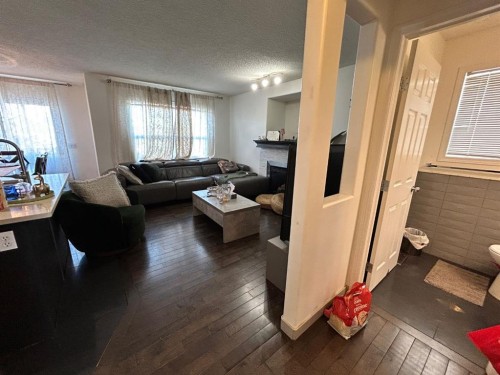 86 Covepark Road, Calgary, AB - Indoor Photo Showing Living Room