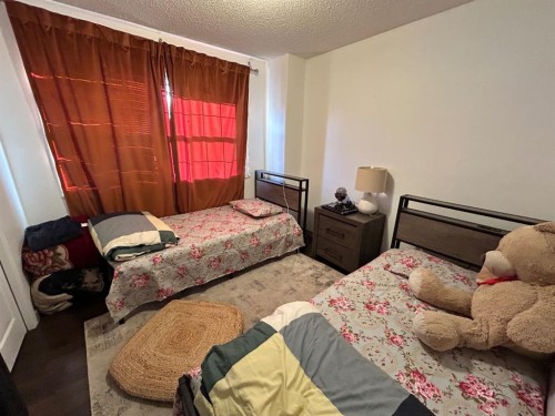 86 Covepark Road, Calgary, AB - Indoor Photo Showing Bedroom