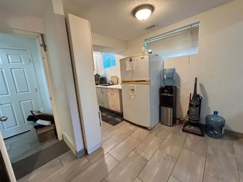 86 Covepark Road, Calgary, AB - Indoor Photo Showing Laundry Room