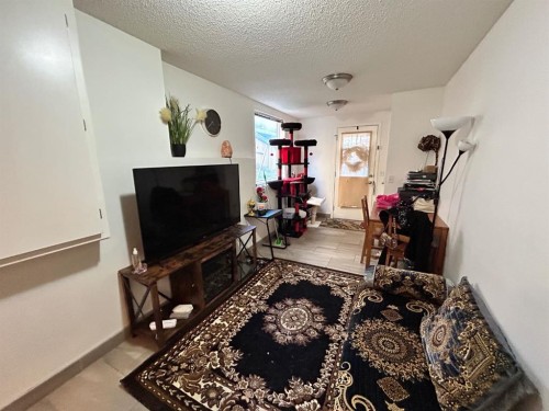 86 Covepark Road, Calgary, AB - Indoor Photo Showing Living Room
