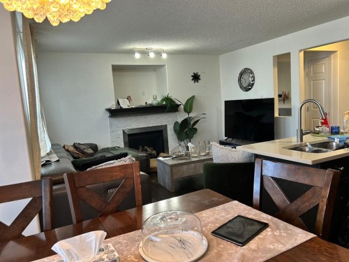 86 Covepark Road, Calgary, AB - Indoor With Fireplace