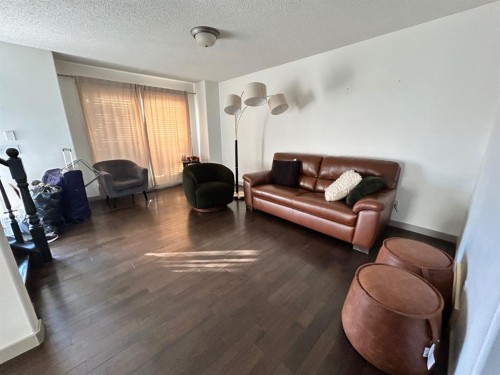 86 Covepark Road, Calgary, AB - Indoor Photo Showing Living Room