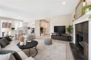 151 Citadel Close Nw, Calgary, AB  - Indoor Photo Showing Living Room With Fireplace 