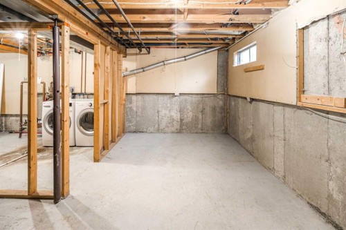 16-6915 Ranchview Drive Nw, Calgary, AB - Indoor Photo Showing Basement