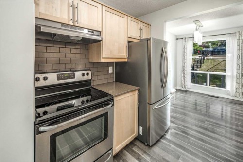 16-6915 Ranchview Drive Nw, Calgary, AB - Indoor Photo Showing Kitchen