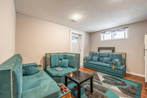 35 Martin Crossing Park Ne, Calgary, AB - Indoor Photo Showing Living Room