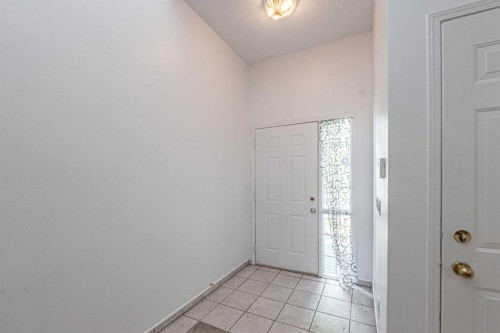 35 Martin Crossing Park Ne, Calgary, AB - Indoor Photo Showing Other Room