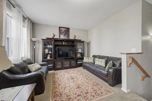 1600 Copperfield Boulevard Se, Calgary, AB - Indoor Photo Showing Living Room