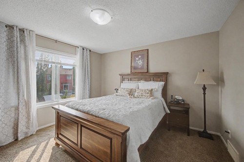 1600 Copperfield Boulevard Se, Calgary, AB - Indoor Photo Showing Bedroom