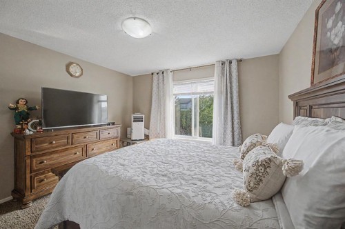 1600 Copperfield Boulevard Se, Calgary, AB - Indoor Photo Showing Bedroom