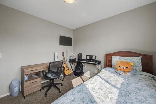 1600 Copperfield Boulevard Se, Calgary, AB - Indoor Photo Showing Bedroom