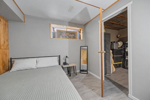 1600 Copperfield Boulevard Se, Calgary, AB - Indoor Photo Showing Bedroom