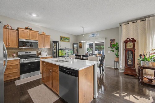 1600 Copperfield Boulevard Se, Calgary, AB - Indoor Photo Showing Kitchen With Double Sink