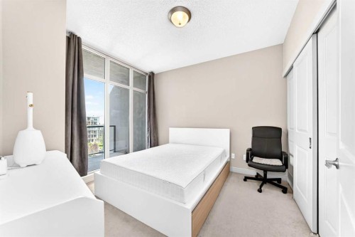 5601-11811 Lake Fraser Drive Se, Calgary, AB - Indoor Photo Showing Bedroom