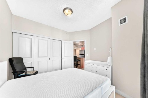 5601-11811 Lake Fraser Drive Se, Calgary, AB - Indoor Photo Showing Bedroom