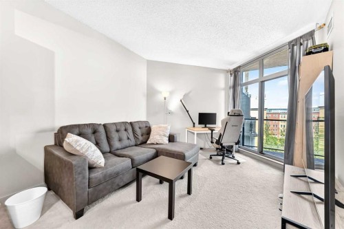 5601-11811 Lake Fraser Drive Se, Calgary, AB - Indoor Photo Showing Living Room