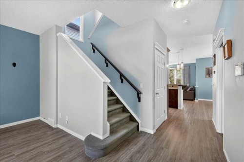 21 Mcintyre Place Nw, Langdon, AB - Indoor Photo Showing Other Room