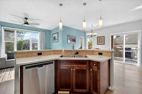 21 Mcintyre Place Nw, Langdon, AB - Indoor Photo Showing Kitchen With Double Sink